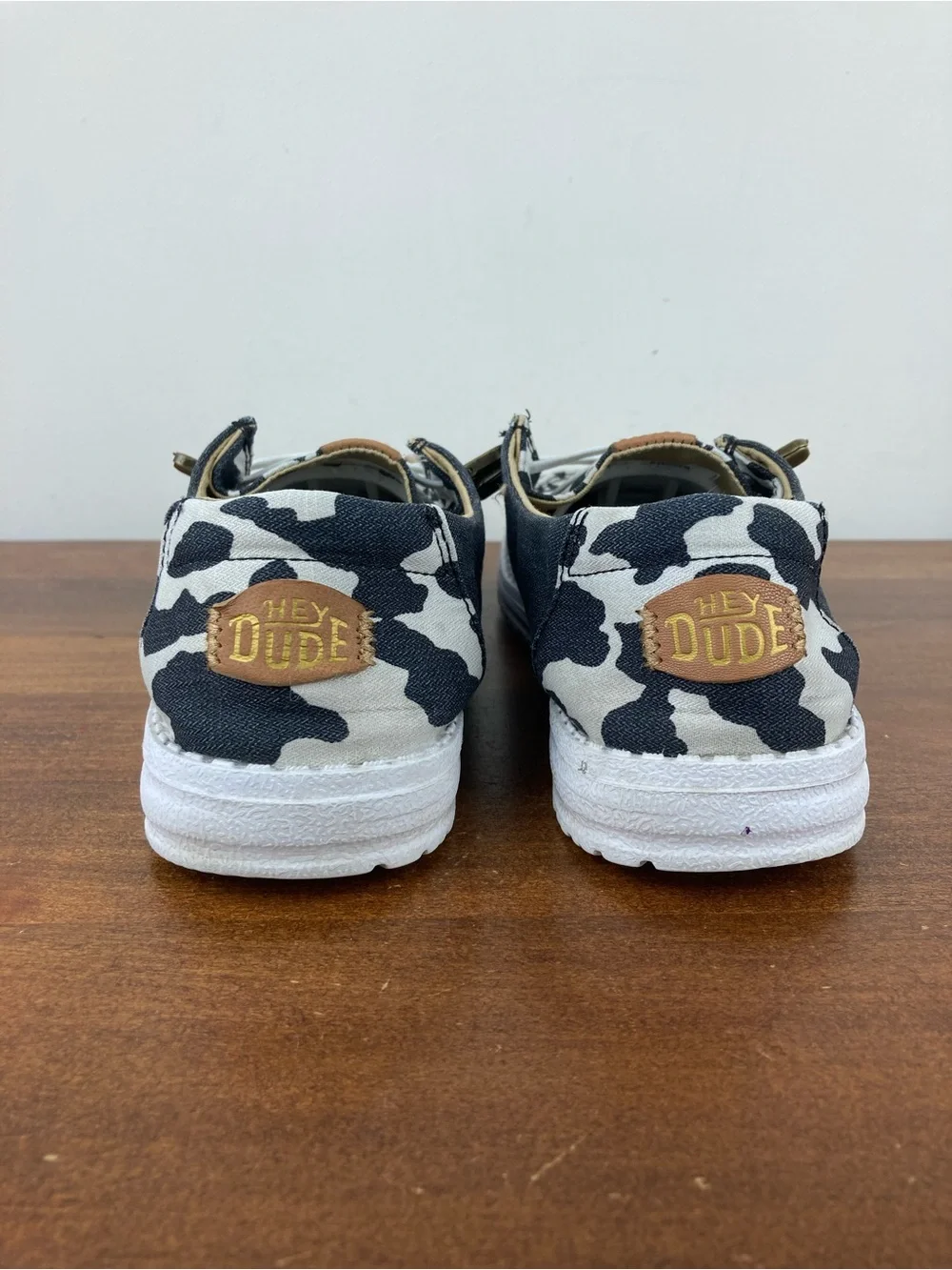 Hey Dude Wendy Animal Black Cow Print Slip-On Shoes 41037-0HO Women's Size 6.